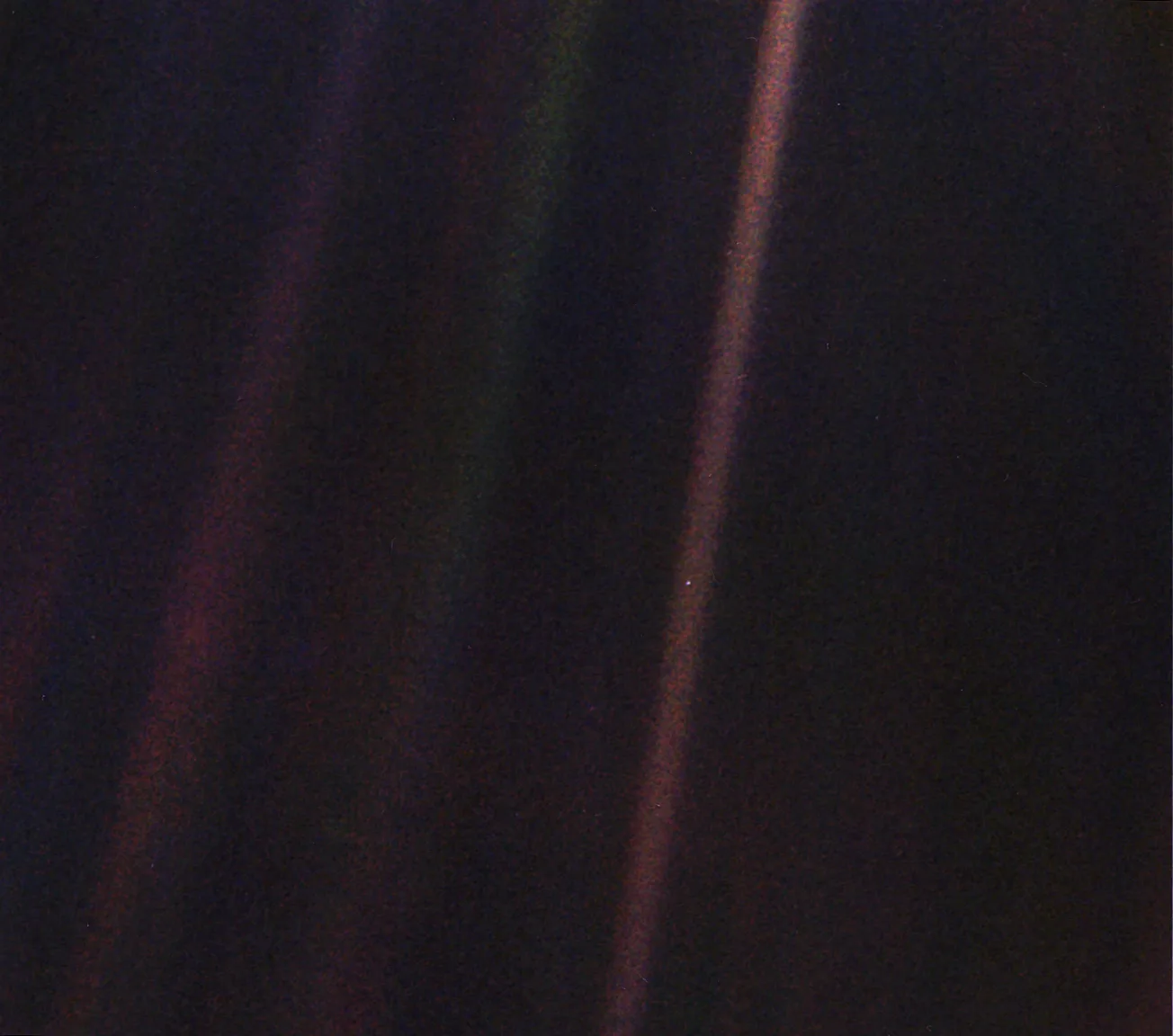 The Pale Blue Dot is a photograph of Earth taken Feb. 14, 1990, by NASA’s Voyager 1 at a distance of 3.7 billion miles (6 billion kilometers) from the Sun.